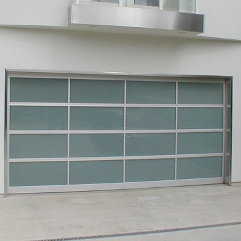 Modern bp Glass Garage Door installed in Playa del Rey California home garage with clear anodized aluminum frame