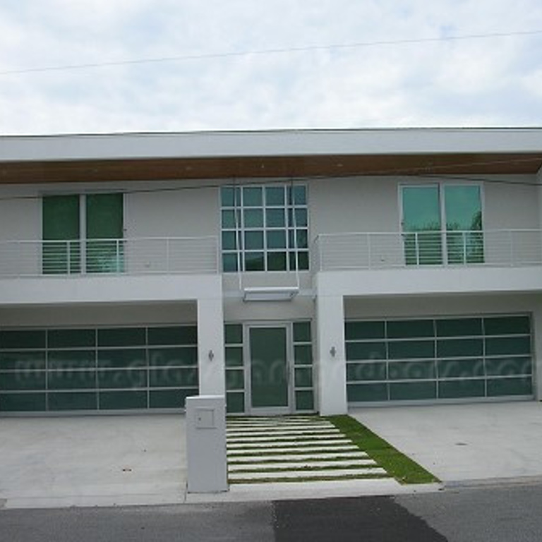 Two bp Glass Garage Doors, installed in a Sarasota, FL residence