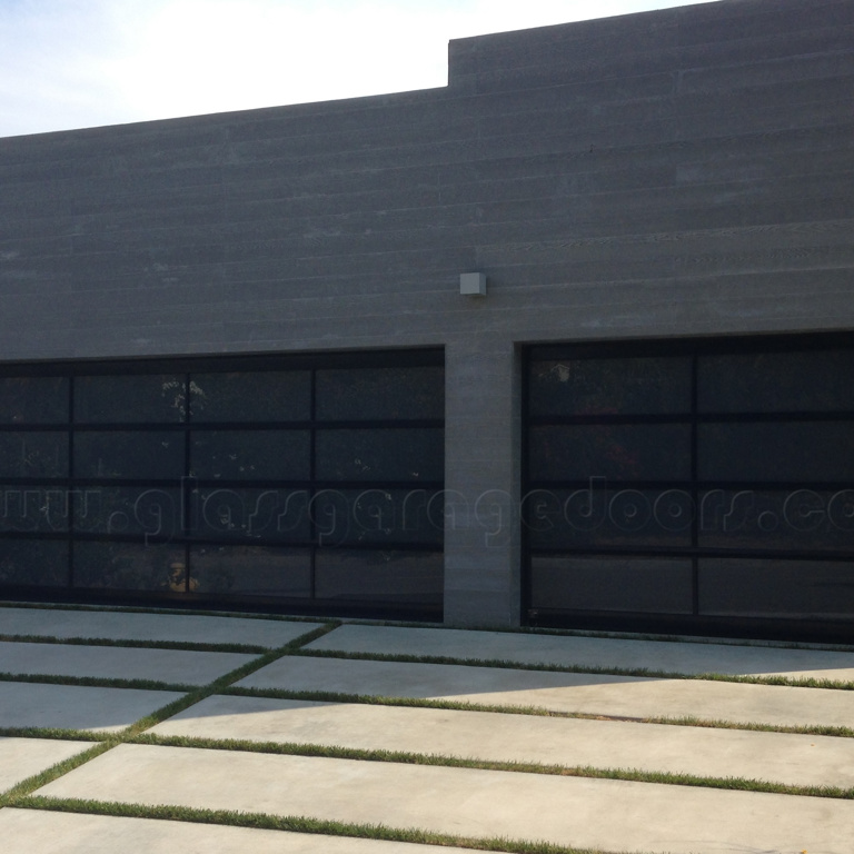 Two dark framed bp Glass Garage Doors installed in Glendale