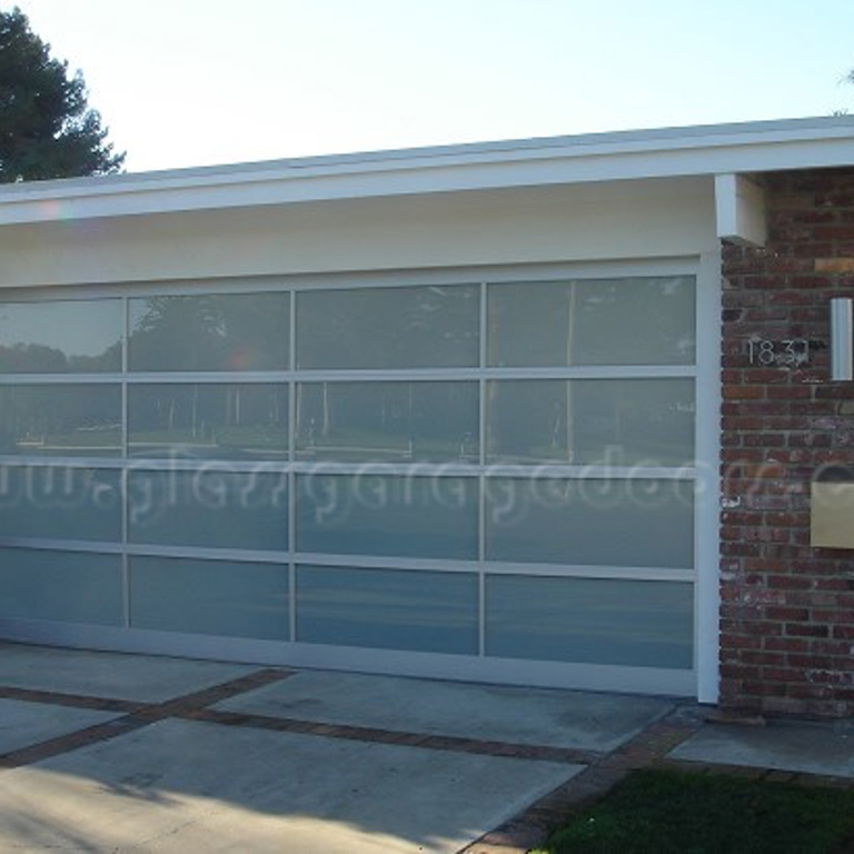 Modern bp Glass Garage Door installed in Corona del Mar CA home garage