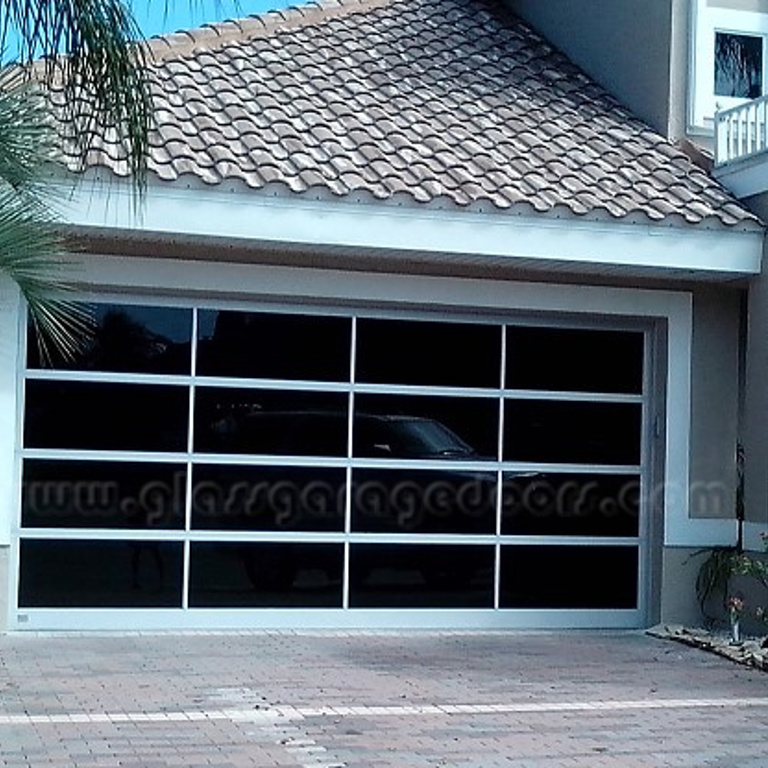 Custom made bp Glass Garage Door installed in Saint Petersburg, FL