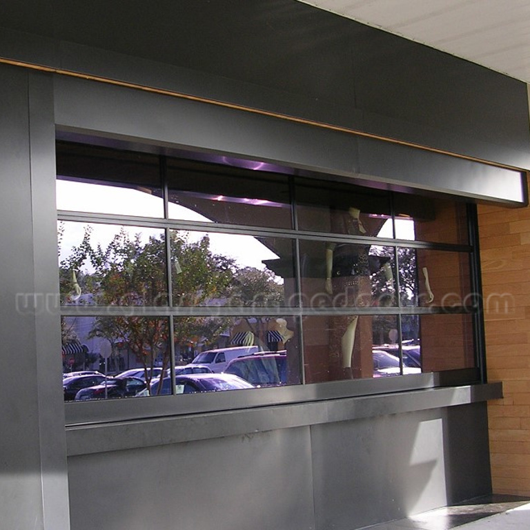 Contemporary storefront featuring full-view bp Glass Garage Door as a stylish and functional store window