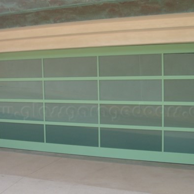 Aluminum-framed bp glass garage door with a unique light green kynar painting finish, creating a cohesive and contemporary look on a residential property.